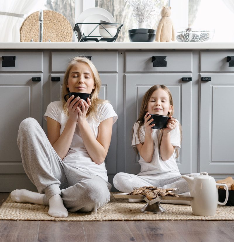Rice-Custom-Cabinetry-Mother-Daugher-Enjoying-Coffee-in-Kitchen